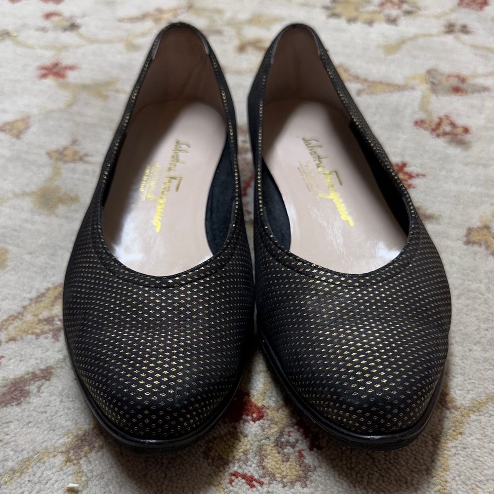 Salvatore Ferragamo black and gold flats